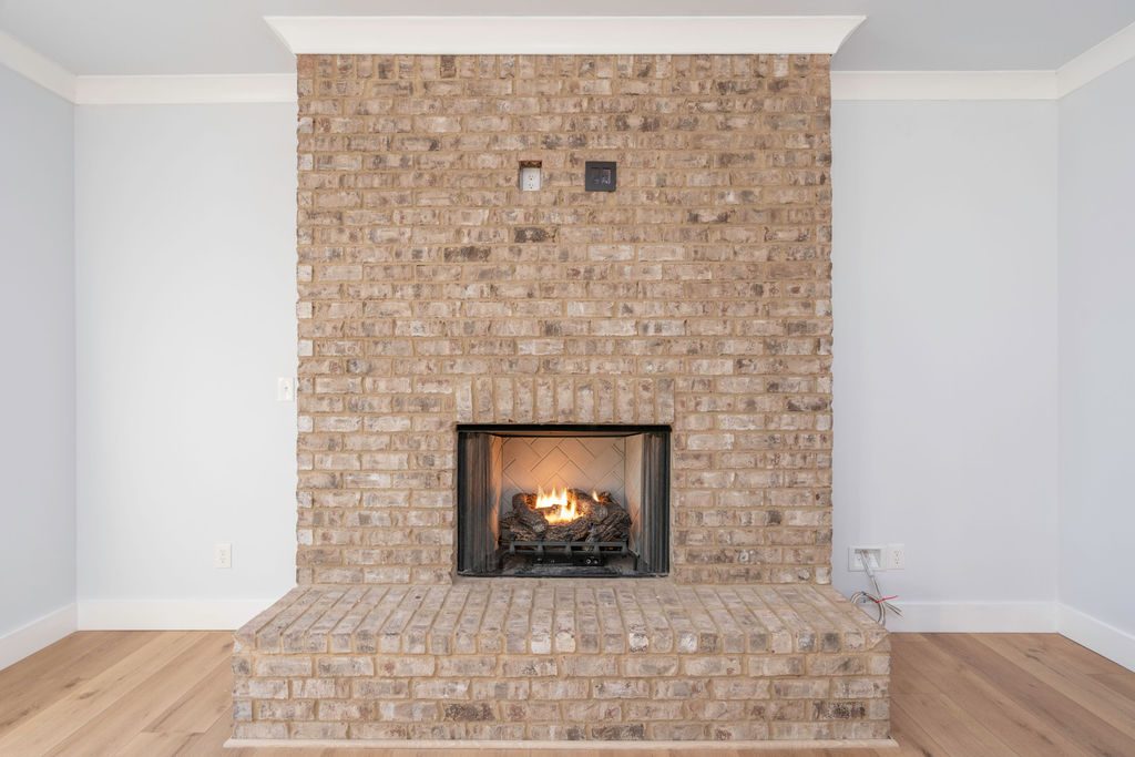 The Brick Cottage brick fireplace