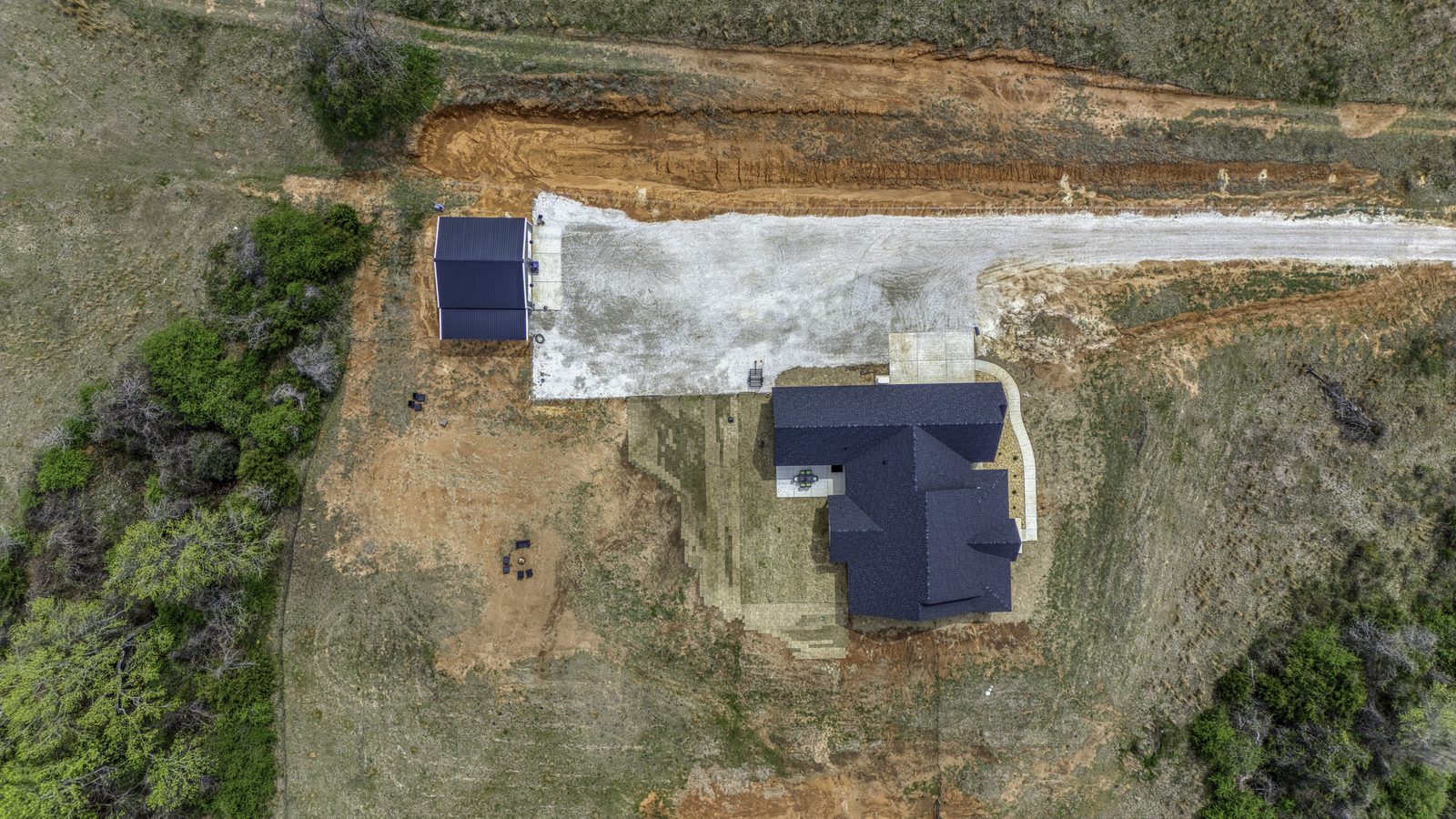 The Stone Craftsman overhead aerial of the home and shop