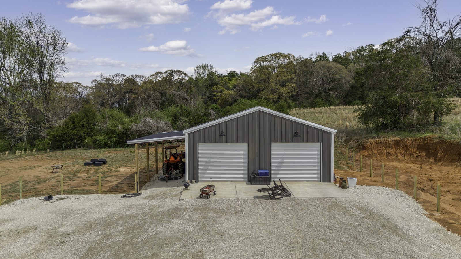 The Stone Craftsman detached two-bay shop with concrete drive