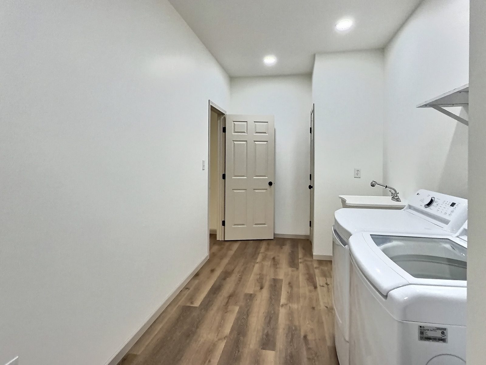 The Cedar Ranch laundry room with washer and dryer