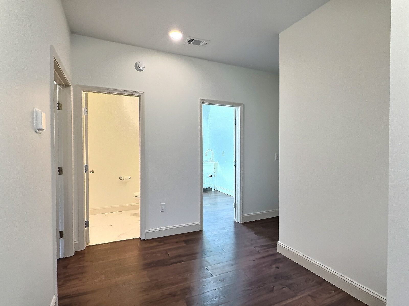 The White Farmhouse hallway to the bathrooms